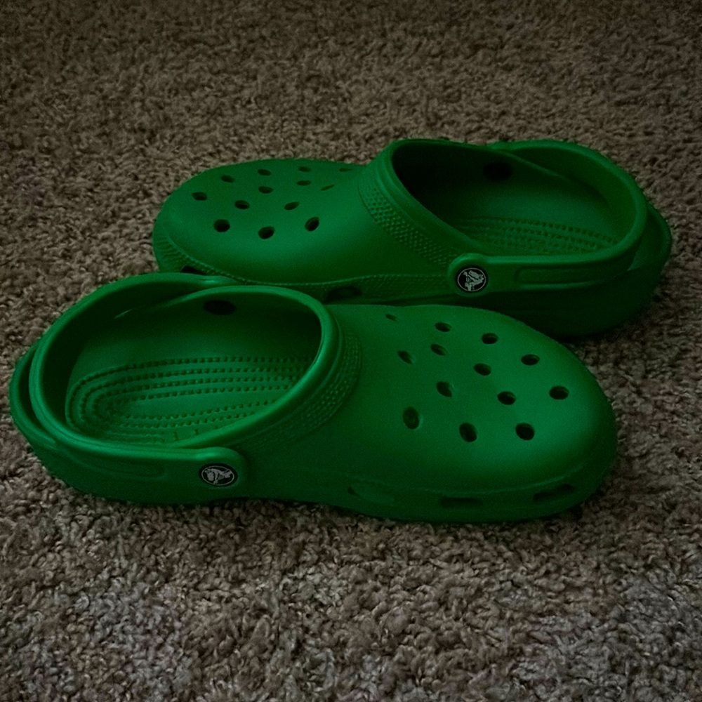 green crocs, size 8 in men 10 in women.